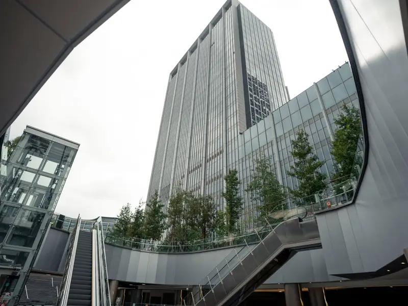 High-rise glass office building in metropolitan area